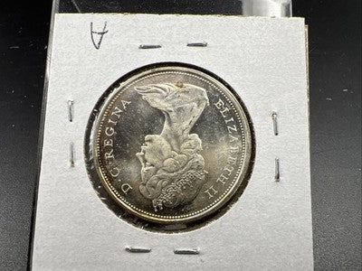 1967 Canada 50 Cents Silver Coin UNC Uncirculated Some Toning