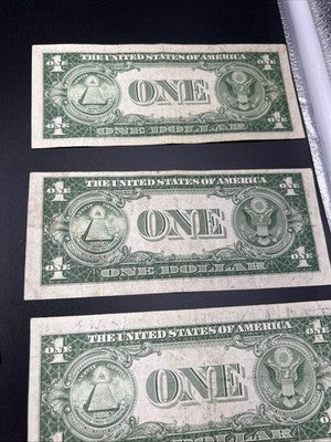 Lot of 7 1935 $1 One Dollar Silver Certificate Blue Seal Notes Fine / VF Circ #7