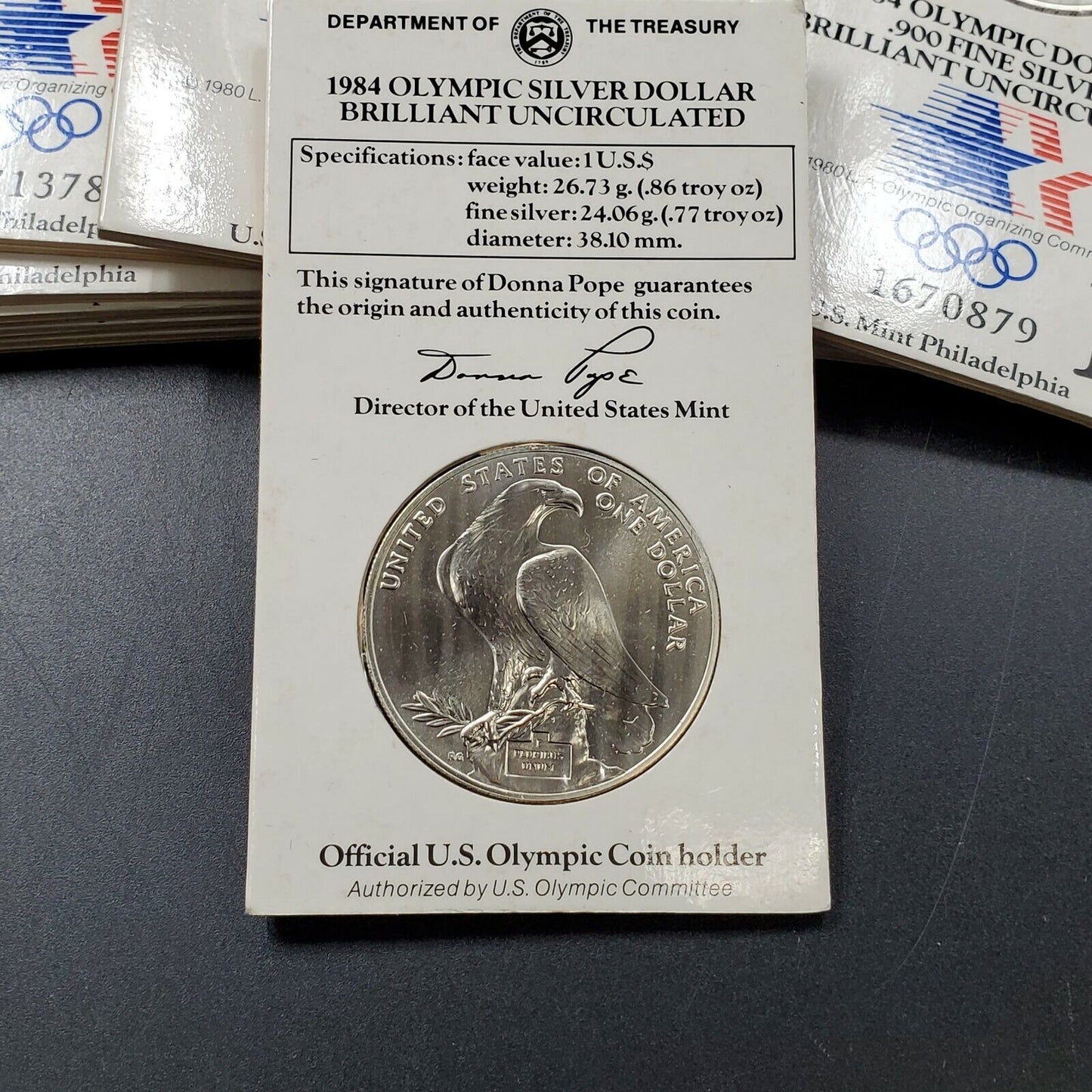 1984 BU LOS ANGELES OLYMPIC SILVER DOLLAR OLYMPICS GIFTCARD PACKADGING GEM UNC