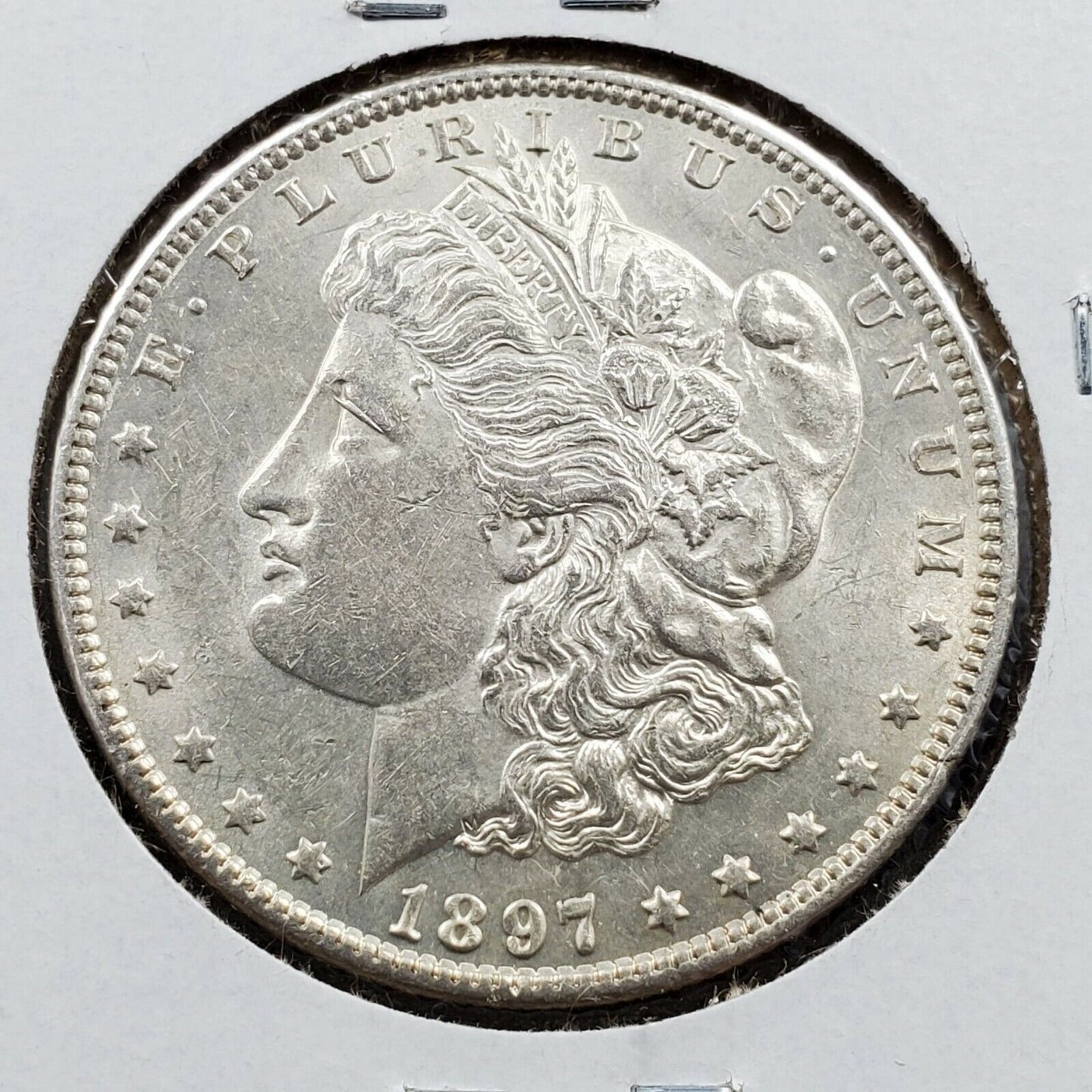 1897 P Morgan 90% Silver Eagle Dollar Coin AVG UNC Struck with Rusty Die REV VAM