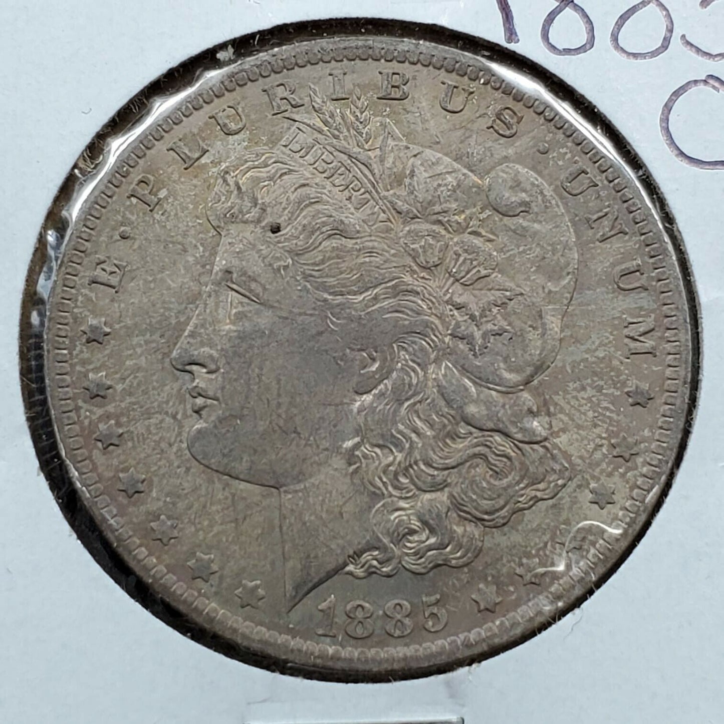 1885 O $1 Morgan Silver Dollar Coin XF AU Circulated Toned Weak Strike