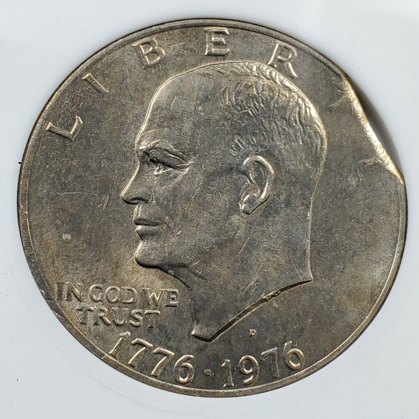 Large Planchet Clip Clipped 1976 D $1 Eisenhower Dollar Ike Coin ANACS MS63