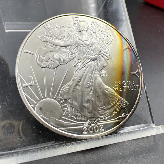 2002 1 Oz .999 American Silver Eagle ASE Coin GEM BU Nice Toning Obverse Toner