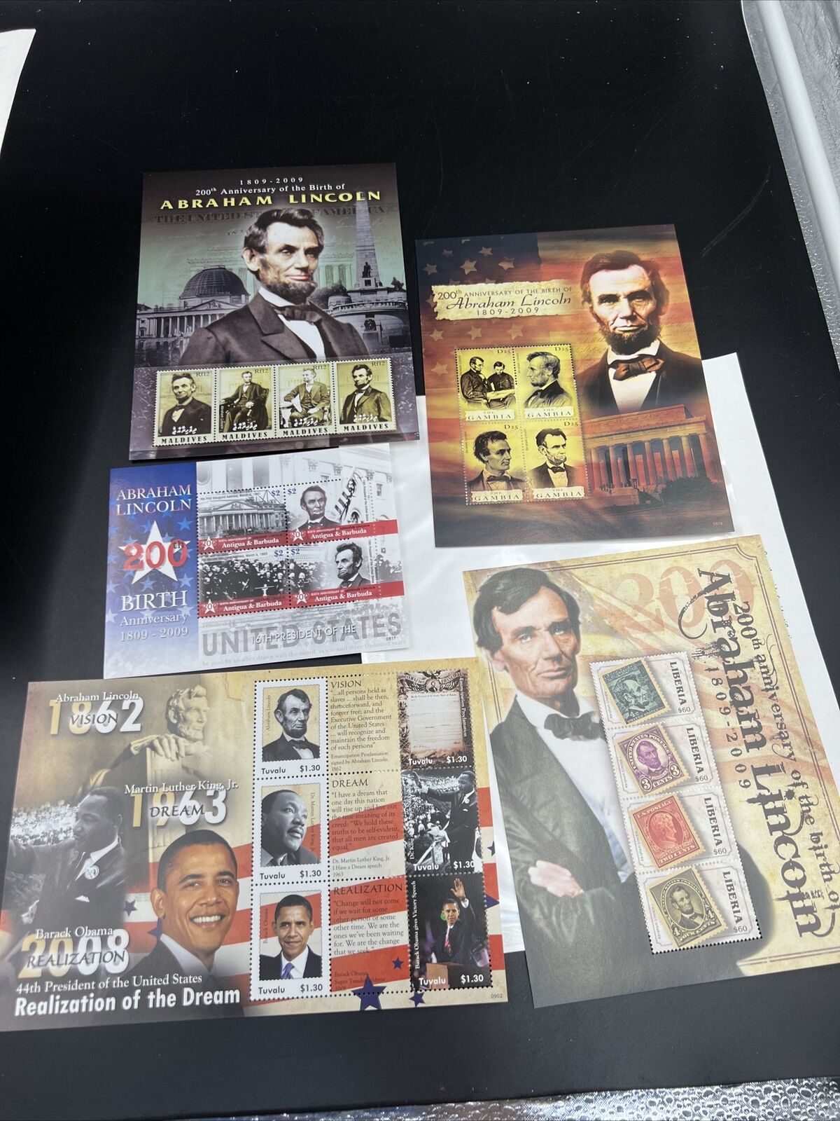 Lot of 5 Collectable Abe Lincoln and Obama Stamp Sheets Antigua Barbuda Tuvalu