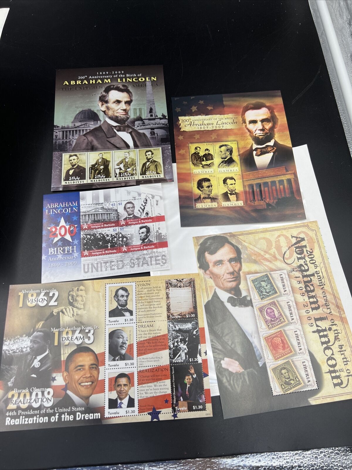 Lot of 5 Collectable Abe Lincoln and Obama Stamp Sheets Antigua Barbuda Tuvalu