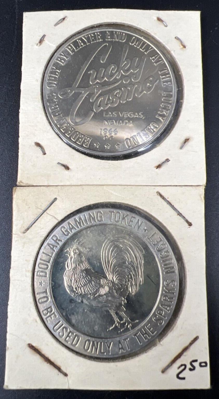 Lot of 2 Specimine / Proof Casino Tokens Sparks Nugget Reno & Lucky Las Vegas