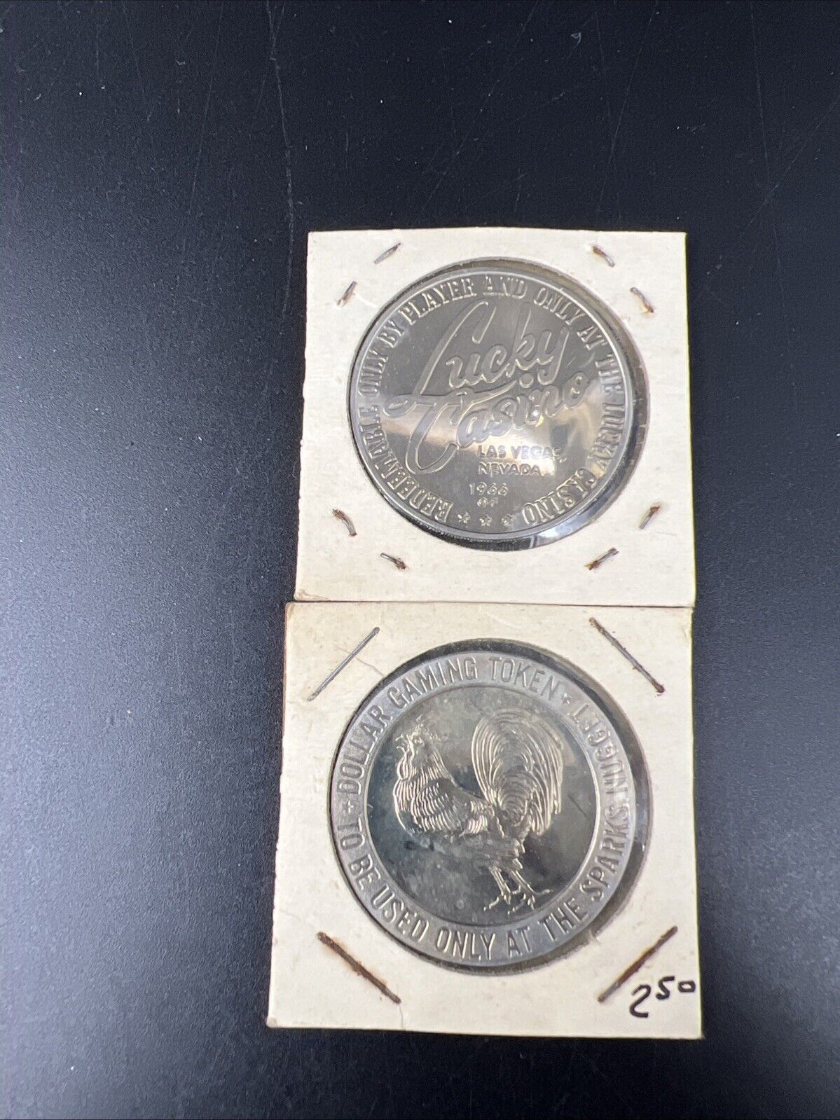 Lot of 2 Specimine / Proof Casino Tokens Sparks Nugget Reno & Lucky Las Vegas