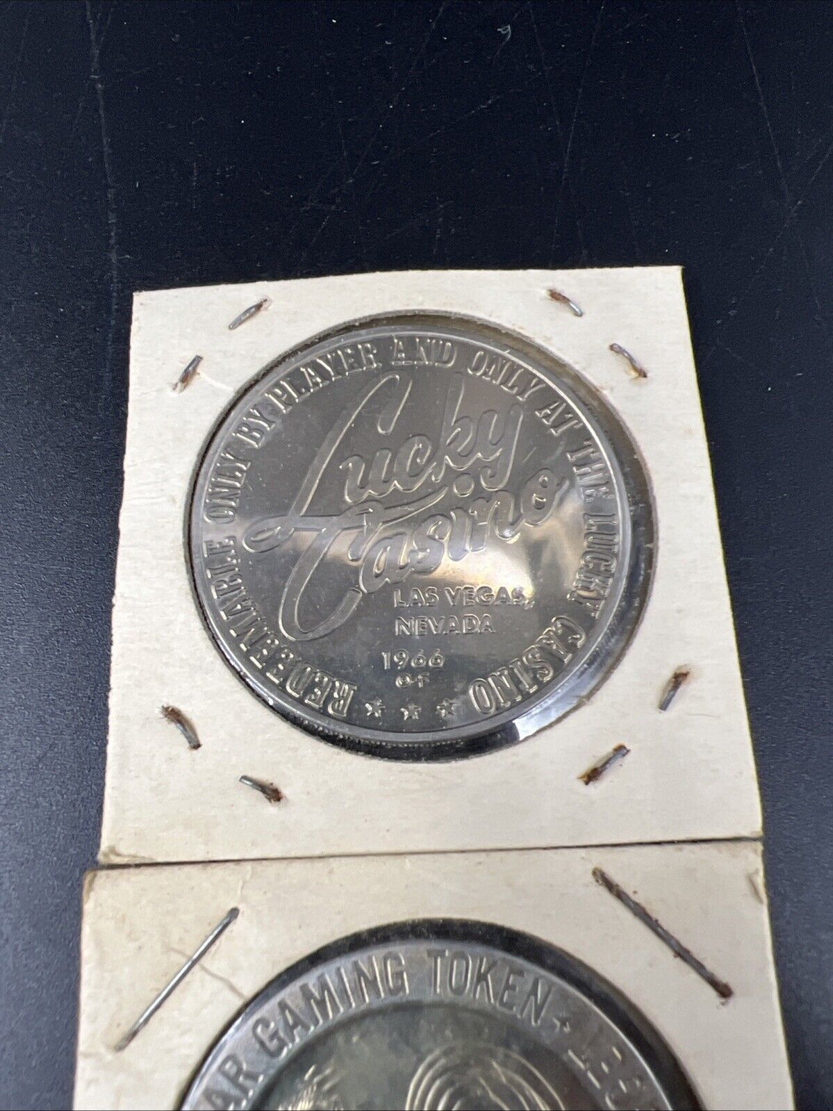 Lot of 2 Specimine / Proof Casino Tokens Sparks Nugget Reno & Lucky Las Vegas