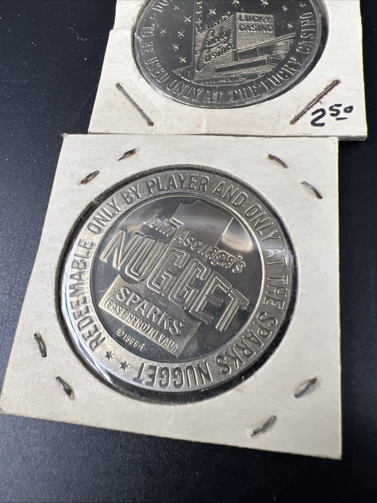 Lot of 2 Specimine / Proof Casino Tokens Sparks Nugget Reno & Lucky Las Vegas