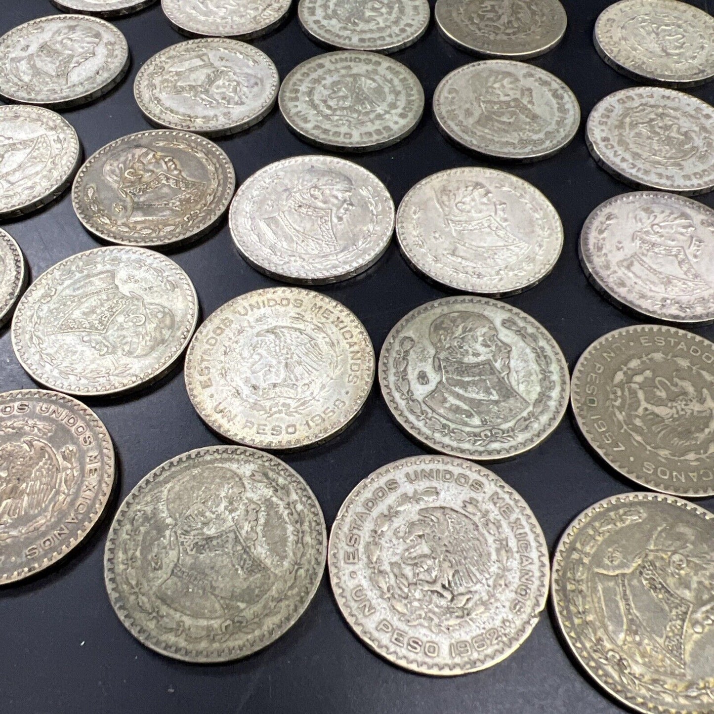 Roll of 25 0.0514 oz Mexico 10% Silver Un Peso Coins Average Circulated #B