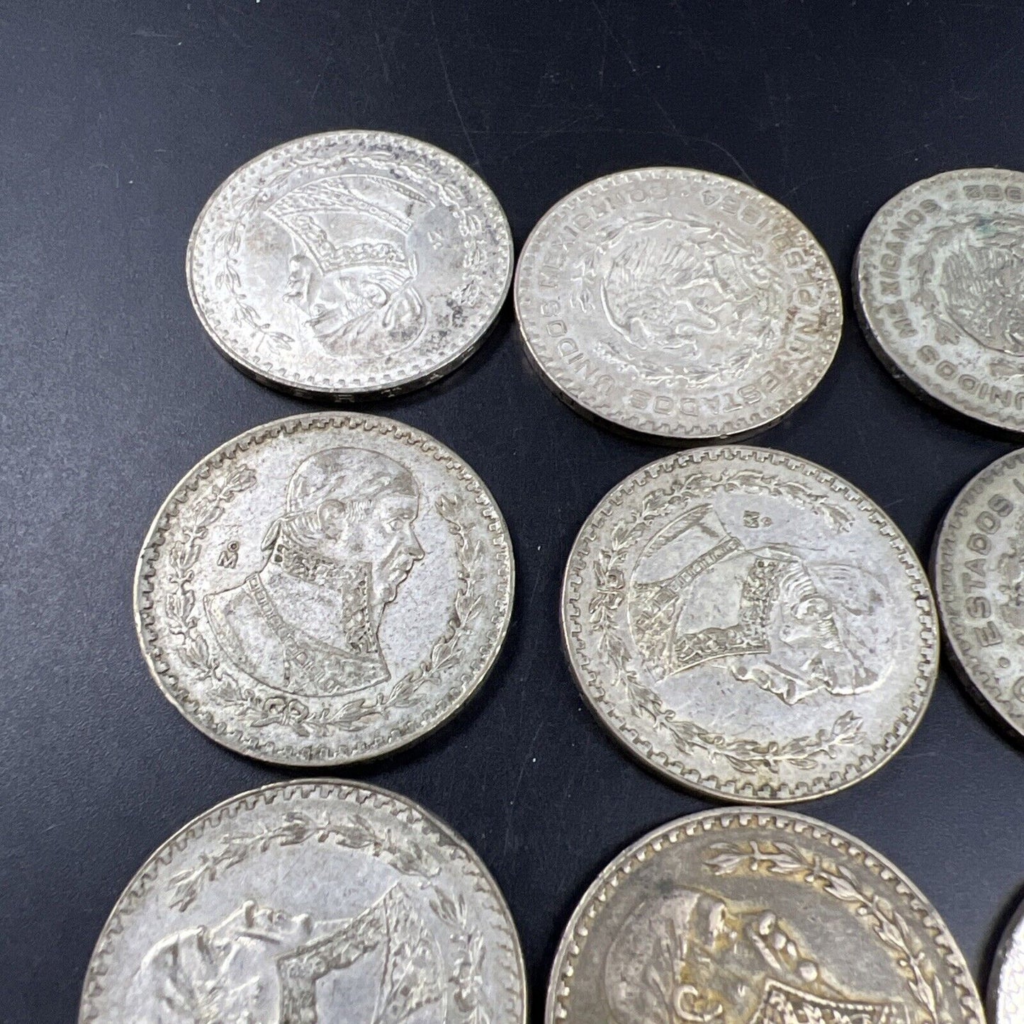Roll of 25 0.0514 oz Mexico 10% Silver Un Peso Coins Average Circulated #B