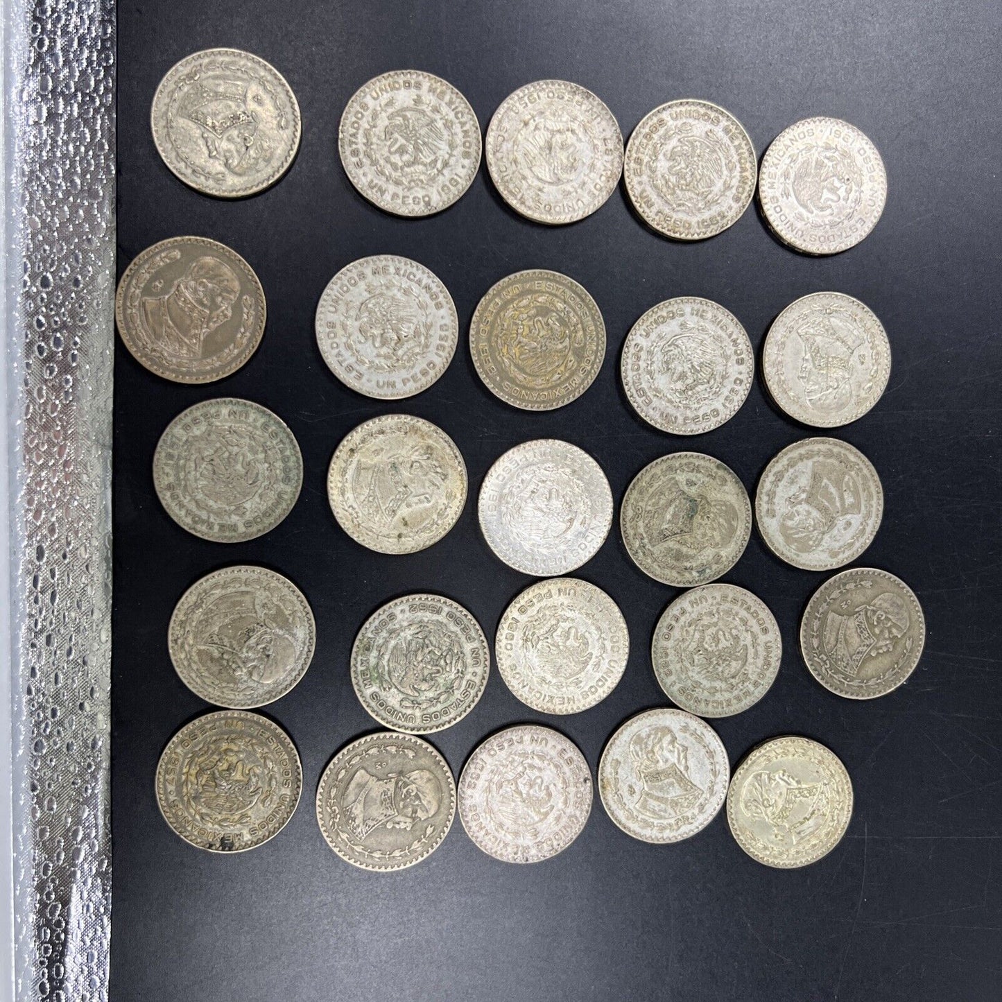 Roll of 25 0.0514 oz Mexico 10% Silver Un Peso Coins Average Circulated #B