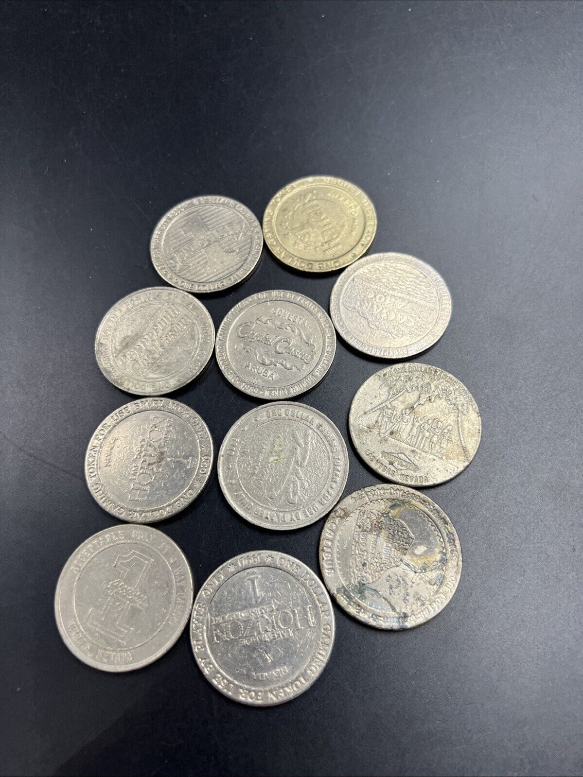 Lot of 11 $1 Casino Gaming Tokens Metal Very Circulated Conditions