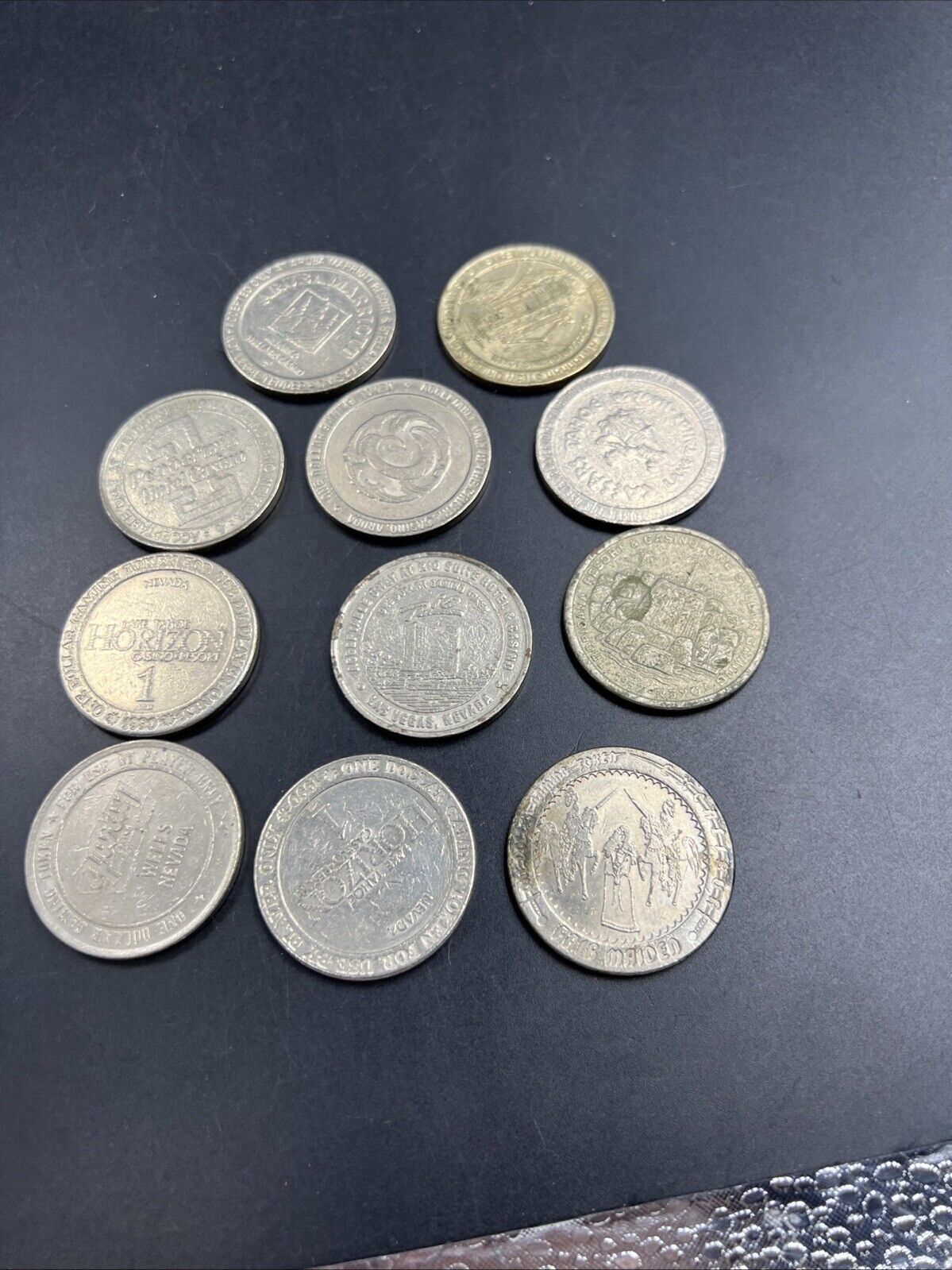 Lot of 11 $1 Casino Gaming Tokens Metal Very Circulated Conditions
