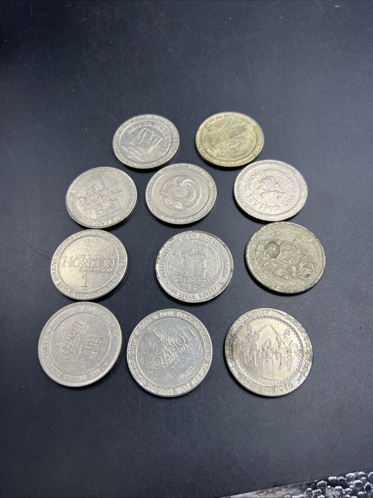 Lot of 11 $1 Casino Gaming Tokens Metal Very Circulated Conditions