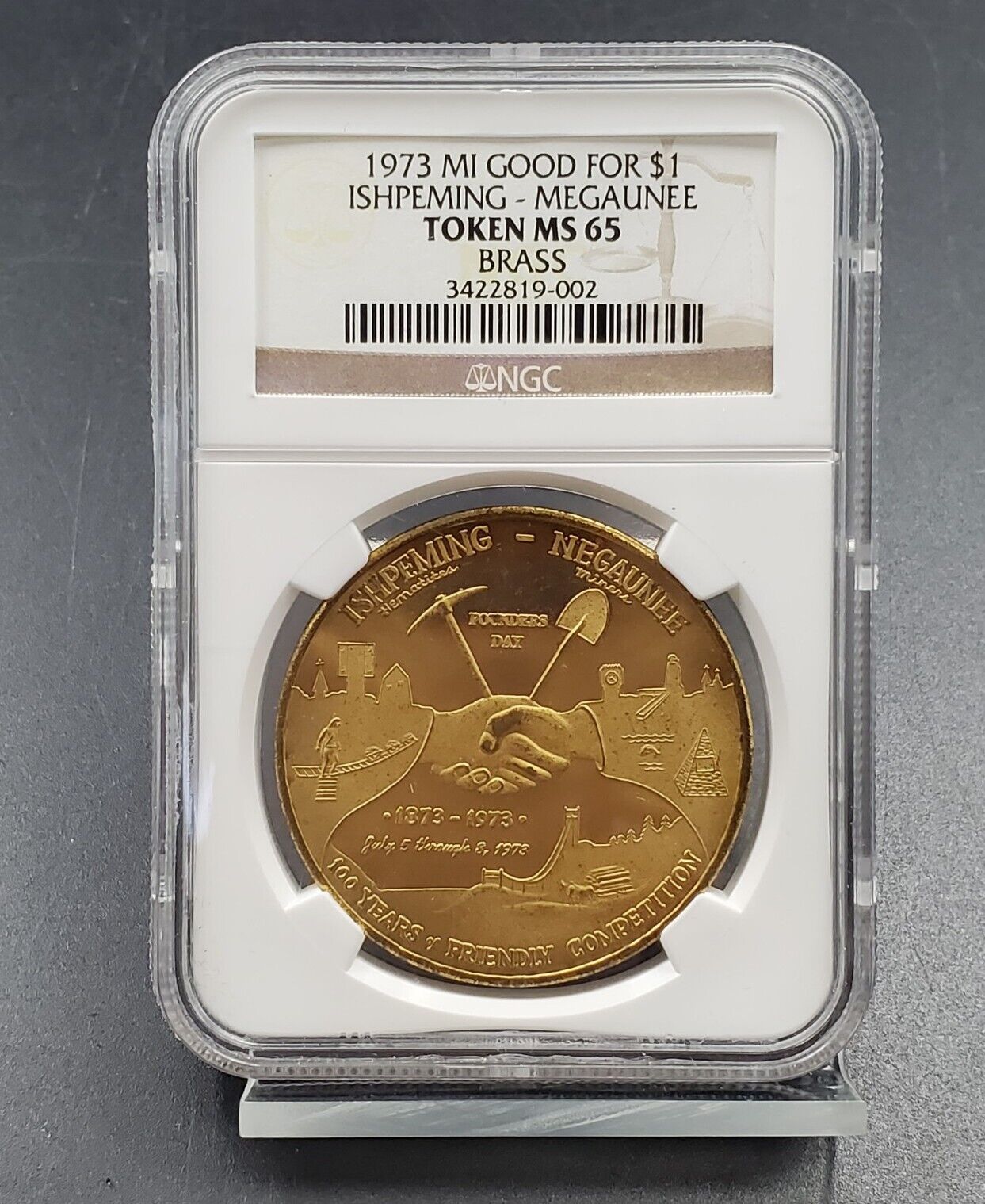1973 MI Good for $1 Ishpeming - Megaunee NGC Token MS65 Brass Gem BU Certified