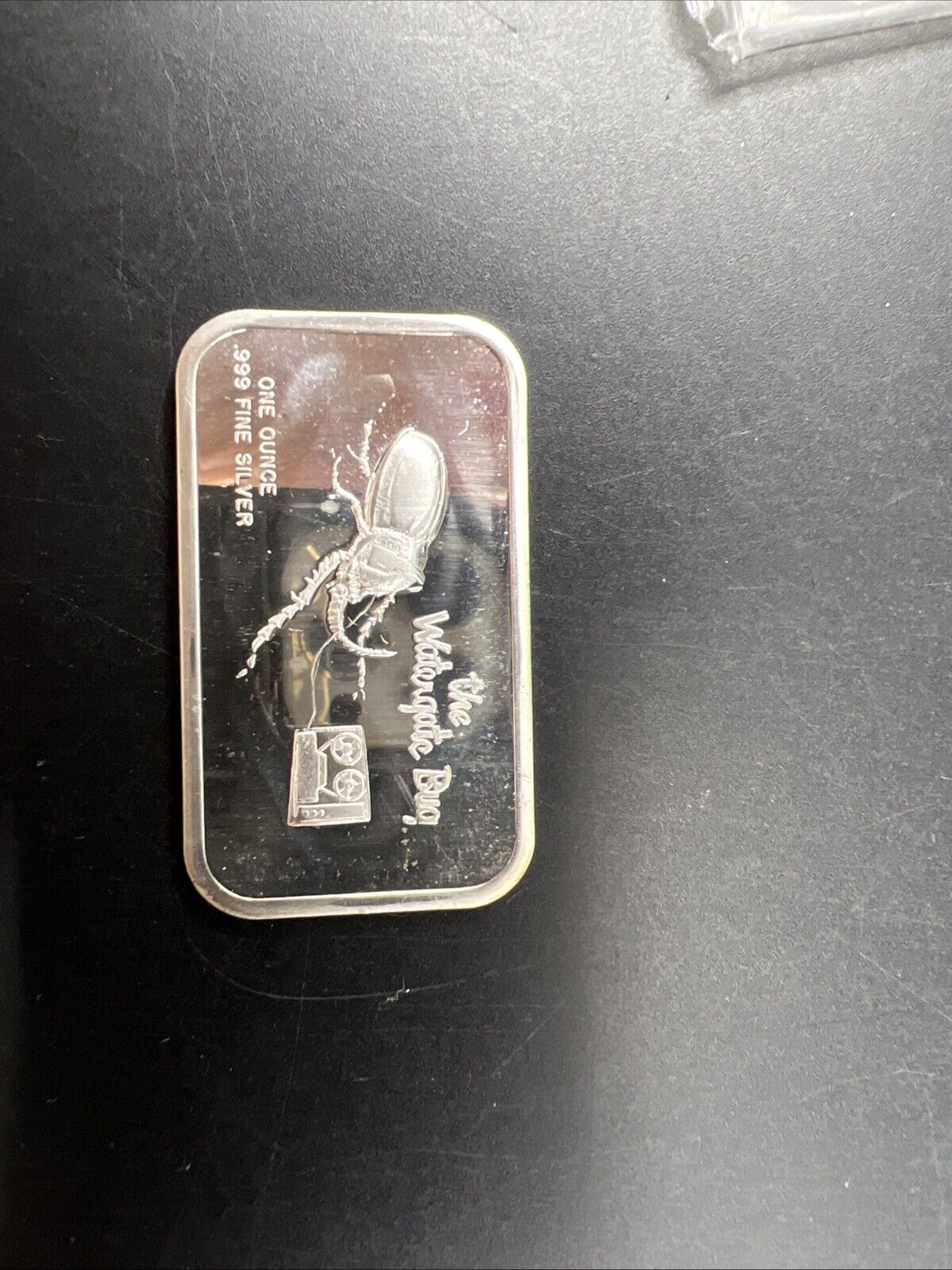 The Watergate Bug 1 oz Silver .999 Fine Art Bar - PL Obverse finish CH UNC