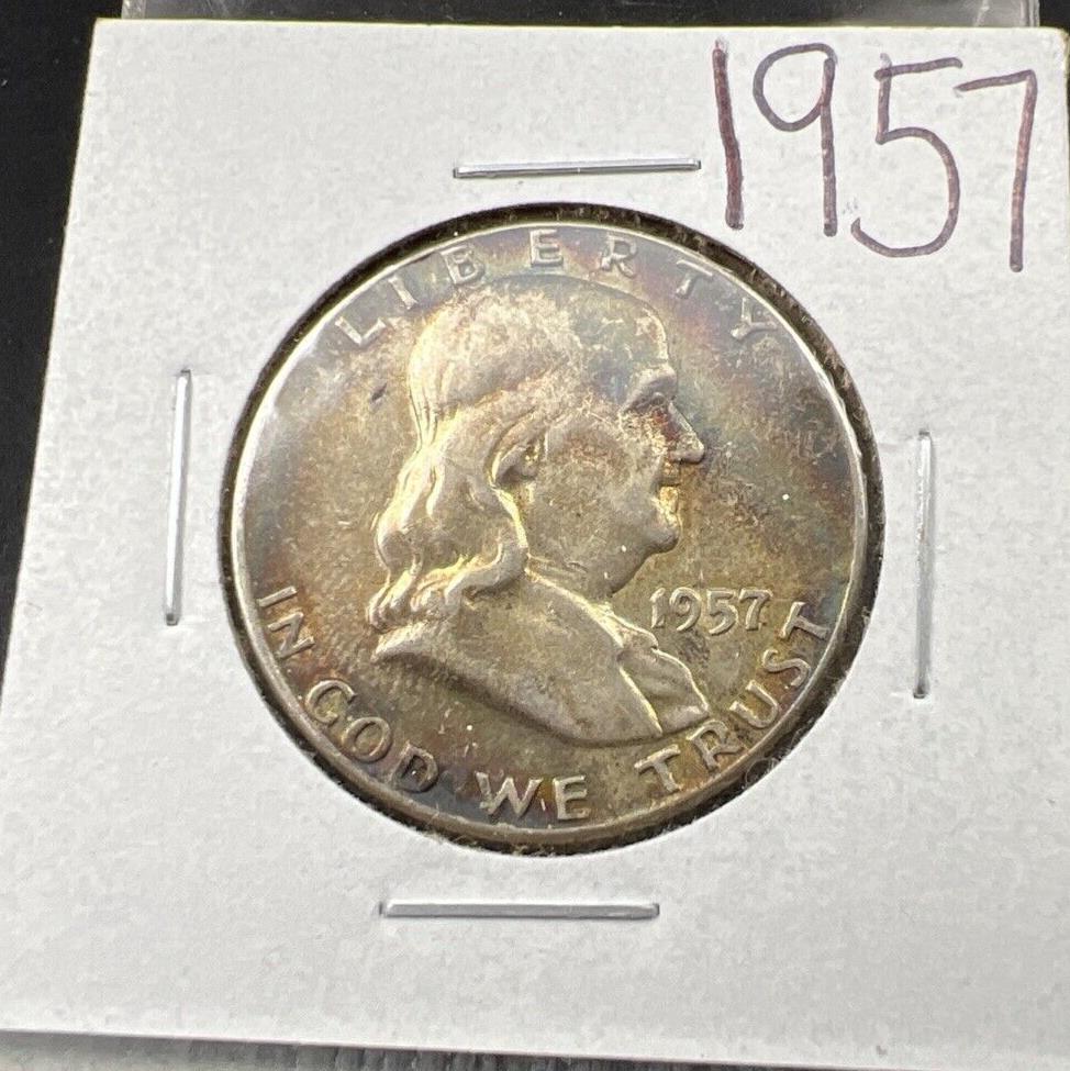 1957 P Franklin Half Dollar Rainbow Toning Obverse VF Very Fine Circulated