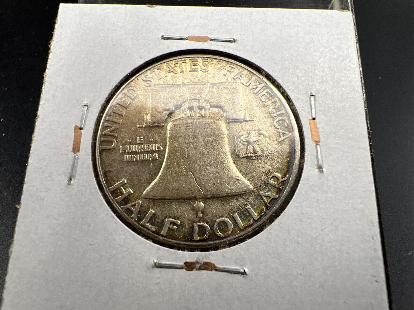 1957 P Franklin Half Dollar Rainbow Toning Obverse VF Very Fine Circulated