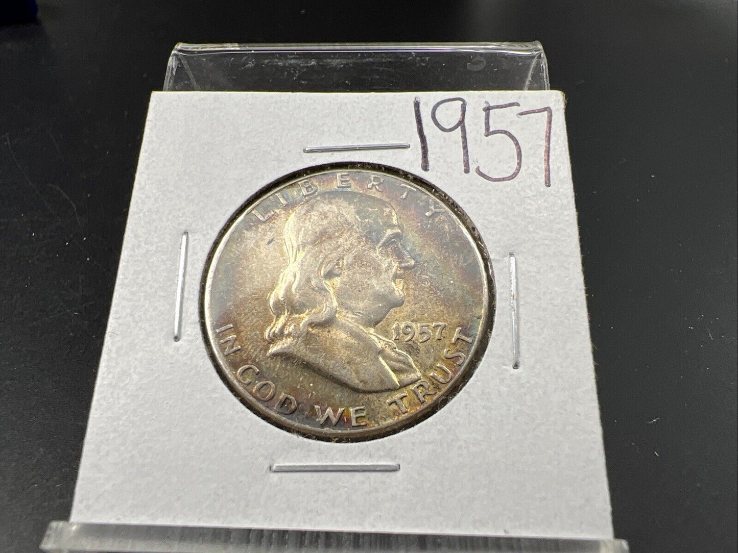 1957 P Franklin Half Dollar Rainbow Toning Obverse VF Very Fine Circulated