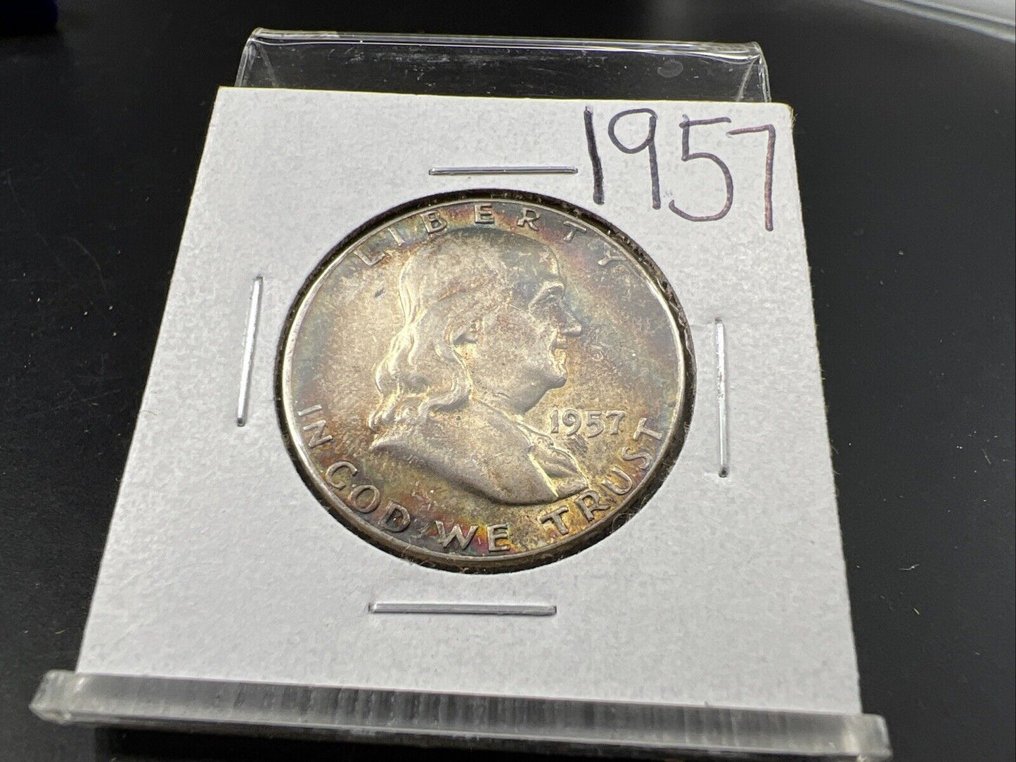 1957 P Franklin Half Dollar Rainbow Toning Obverse VF Very Fine Circulated