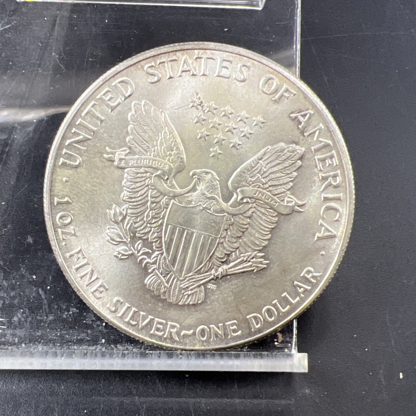 1986 1 OZ American Silver Eagle CH AU About UNC Neat Toning Toner