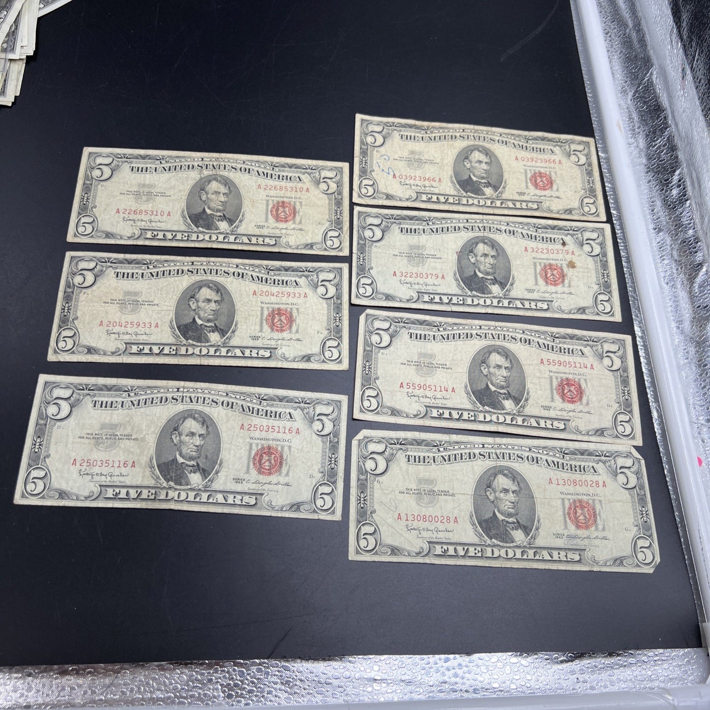 Lot of 7 1963 $5 Legal Tender United States Notes Red Seals Very circulated #116
