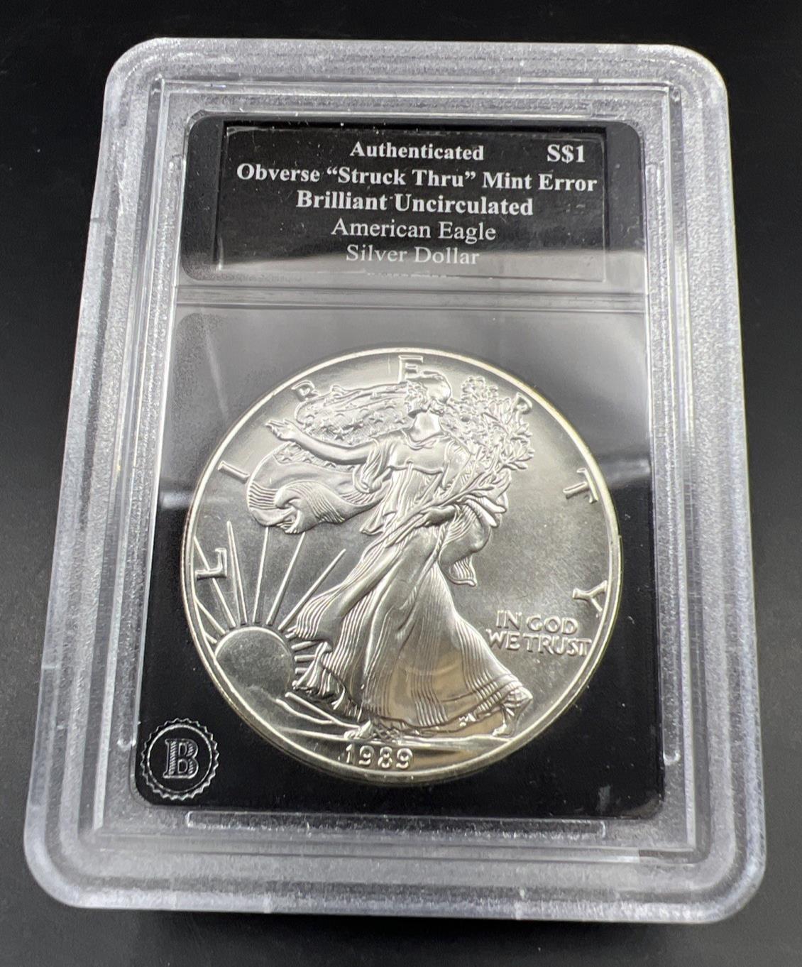 1989 1 Oz ASE American Silver Eagle Coin Obverse Struck Thru Error