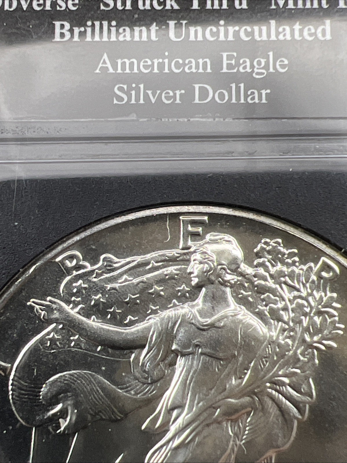 1989 1 Oz ASE American Silver Eagle Coin Obverse Struck Thru Error