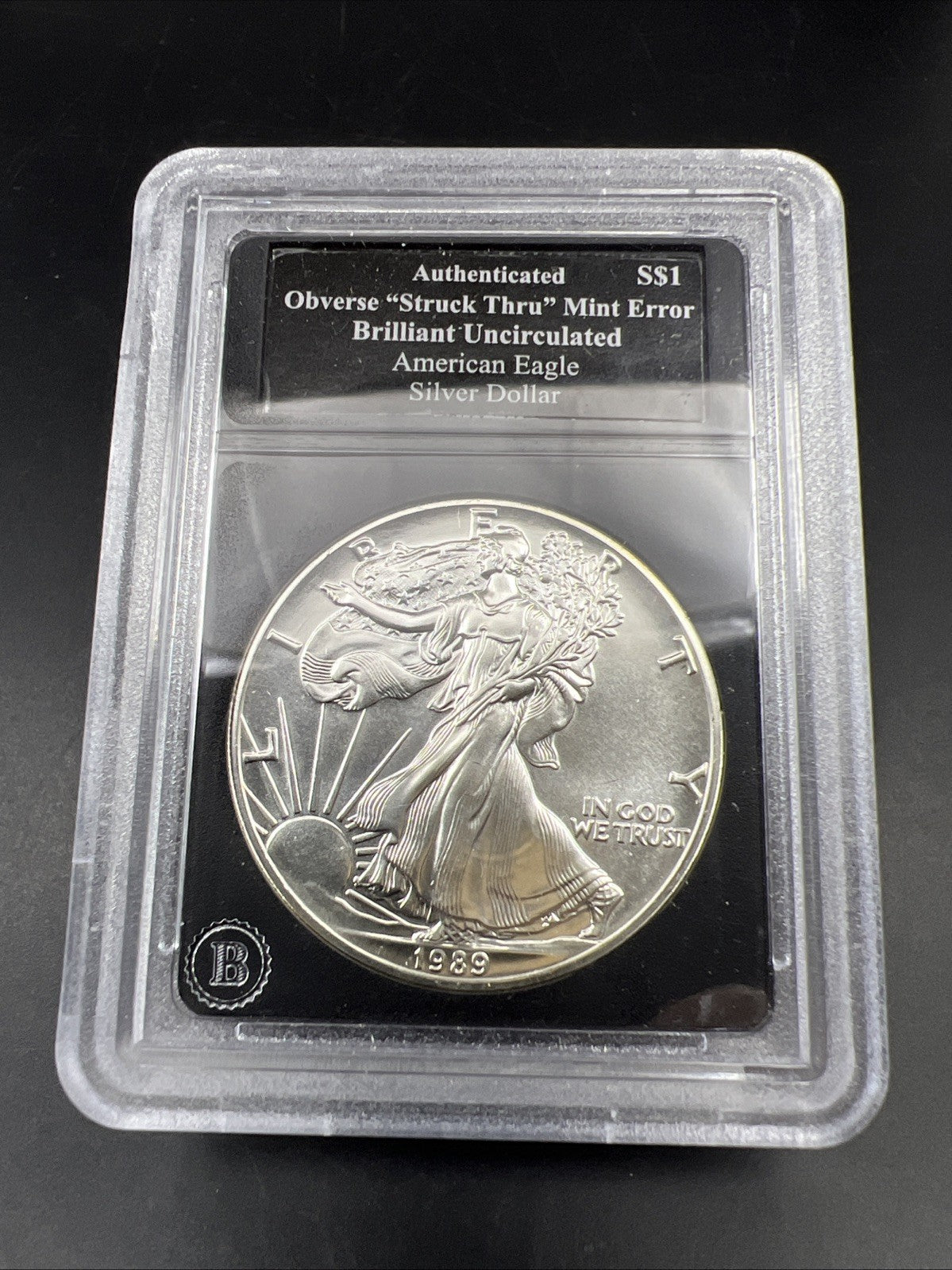 1989 1 Oz ASE American Silver Eagle Coin Obverse Struck Thru Error