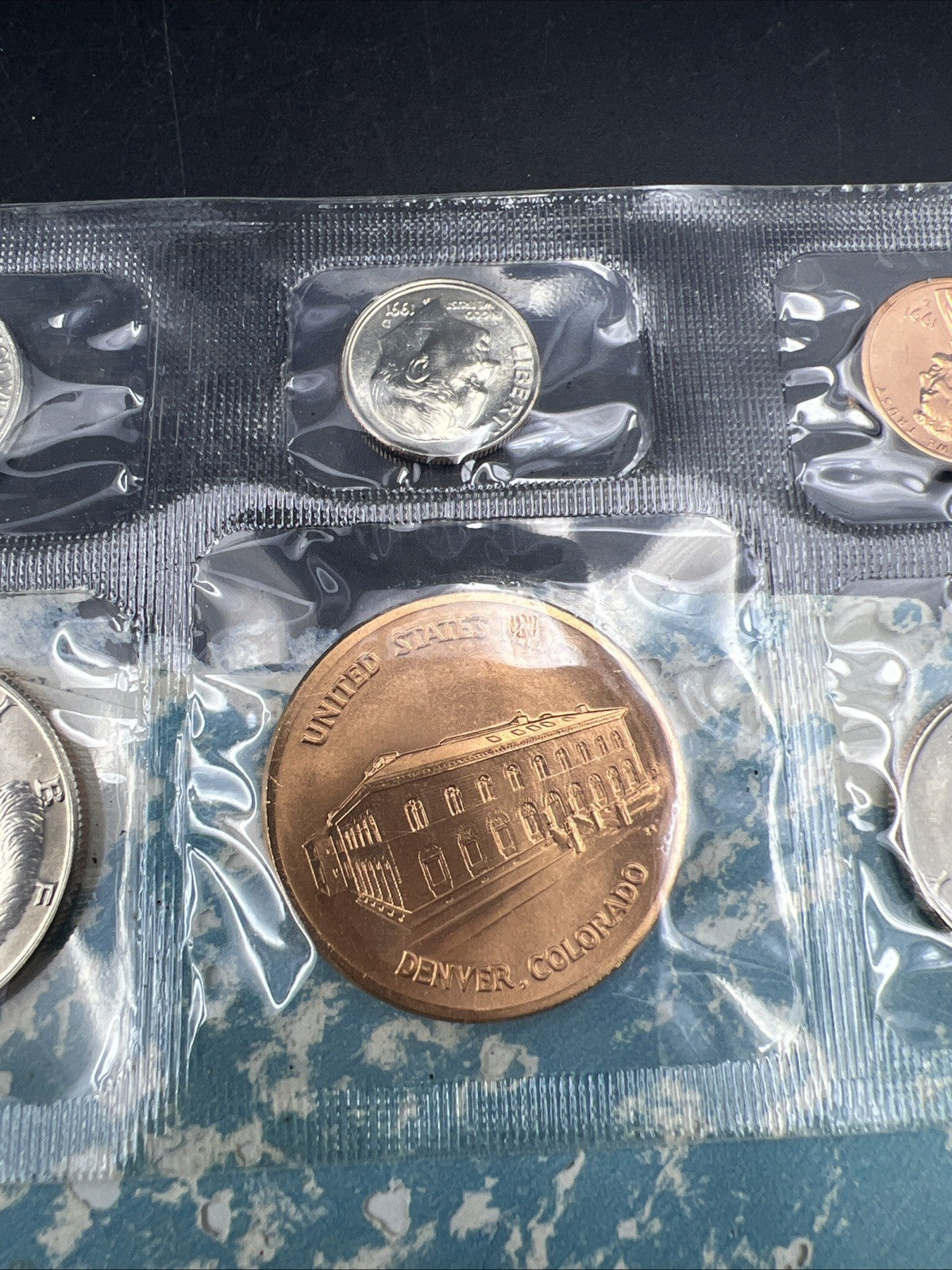 1991 D Denver Mint Souvenir Set Uncirculated Coins and Medal Tattered Envelope