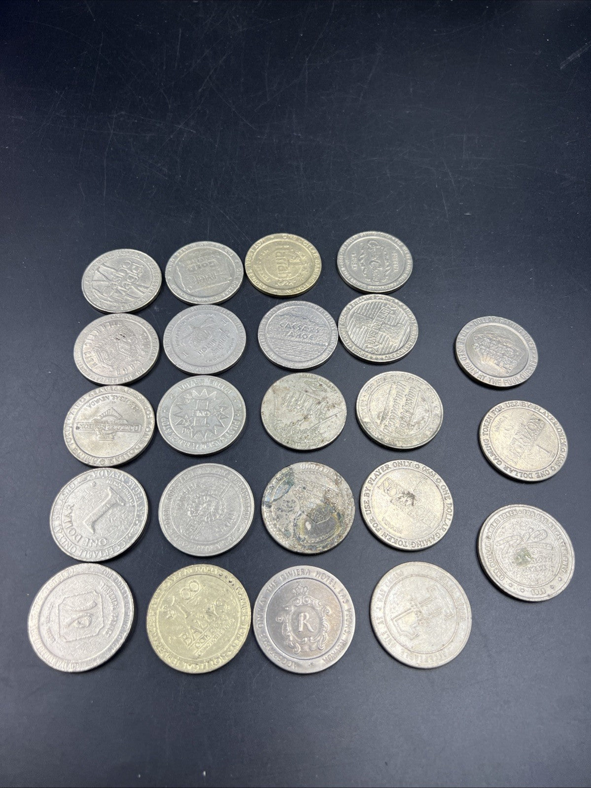 Lot of 23 $1 Casino Gaming Tokens Metal Very Circulated Conditions SKU#A