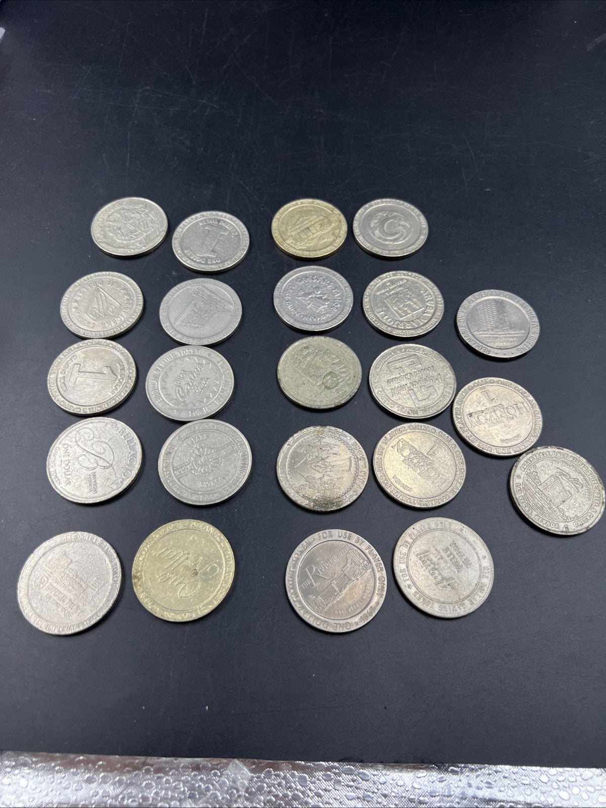 Lot of 23 $1 Casino Gaming Tokens Metal Very Circulated Conditions SKU#A