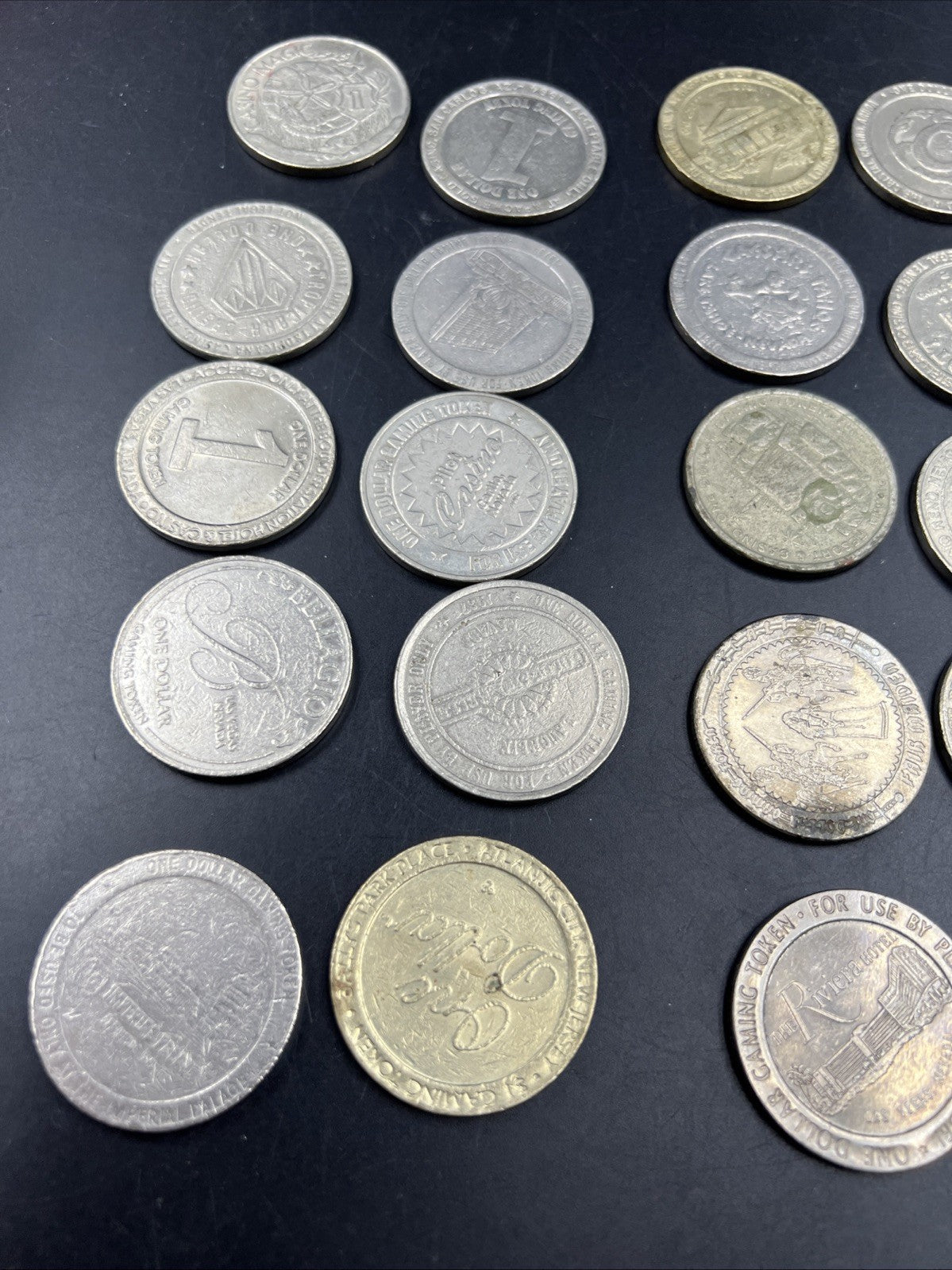 Lot of 23 $1 Casino Gaming Tokens Metal Very Circulated Conditions SKU#A