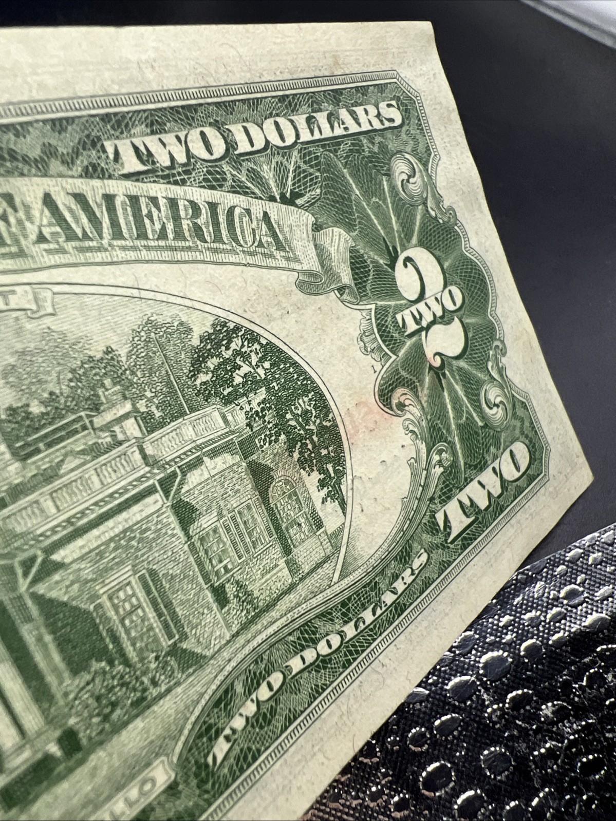 1963 $2 Two Dollar USN Red Seal Legal Tender Note UNC Details water damage #665