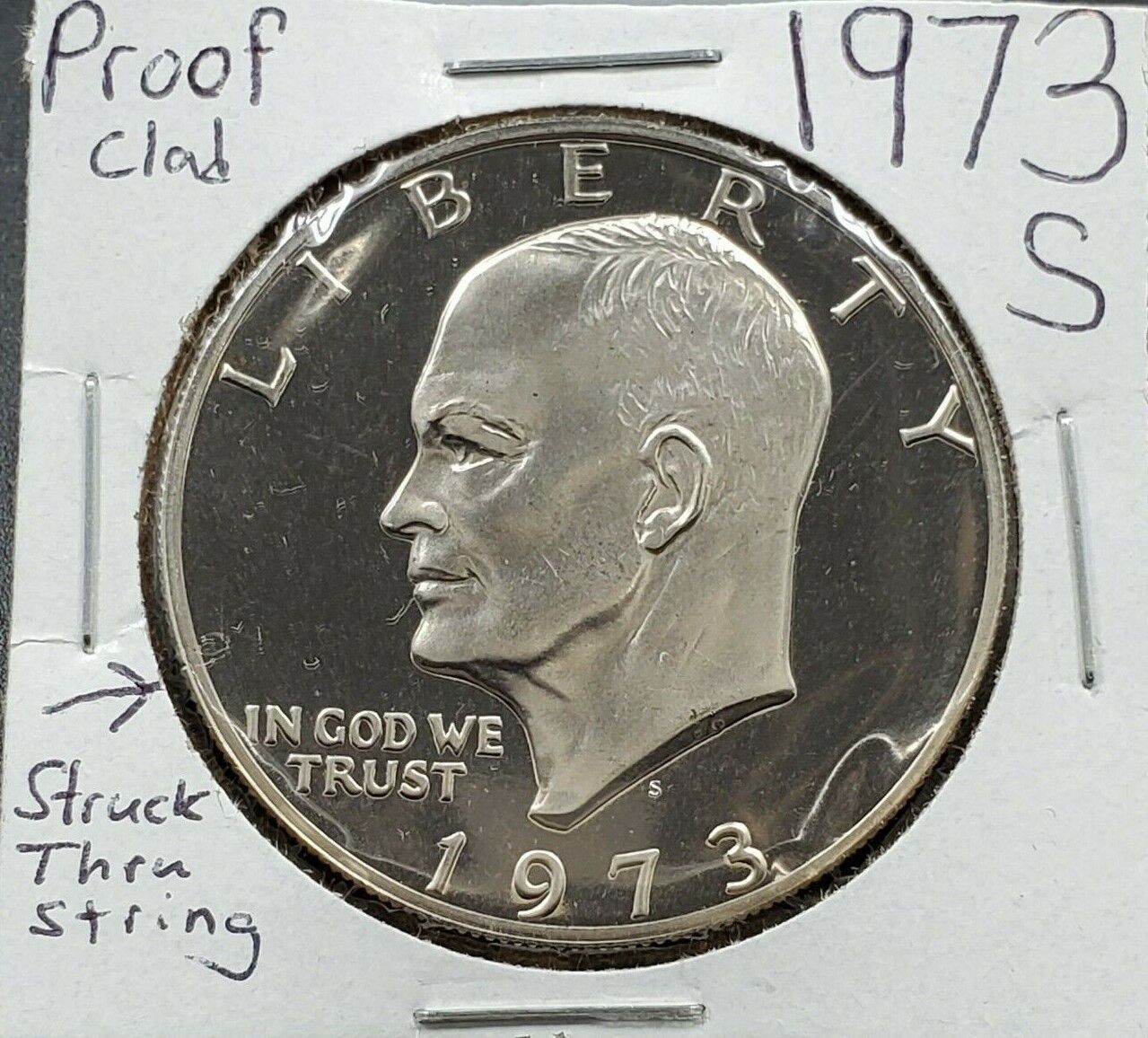 1973 S Ike Eisenhower Dollar Clad Proof Gem DCAM Struck Thru w/String Error Coin