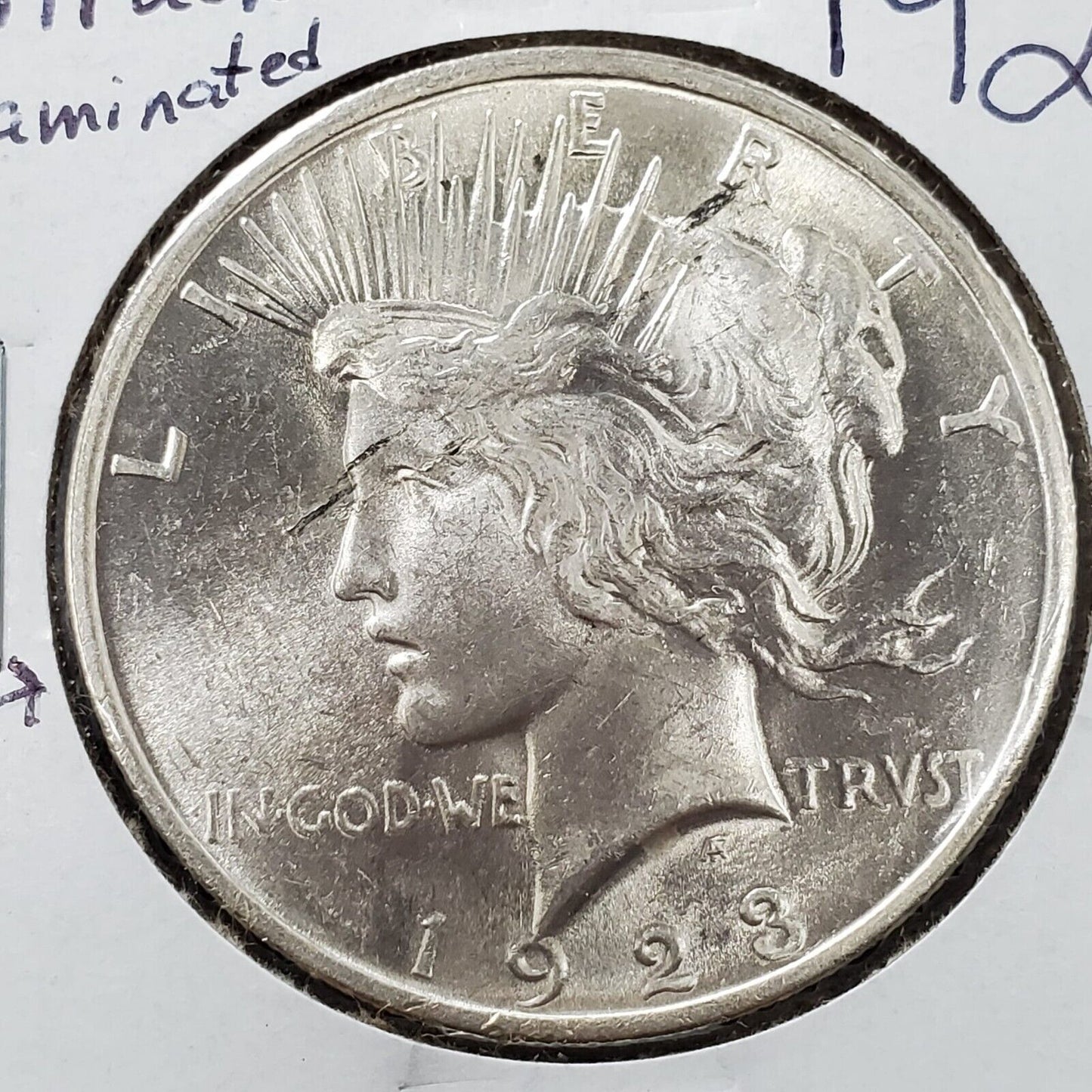 1923 P Peace 90% Silver Eagle Dollar Coin Struck Thru Error Coin Obverse