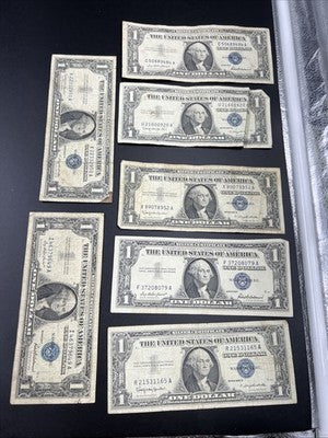 Lot of 7 Circ 1957 $1 One Dollar US Silver Certificates Blue Seal Notes #165