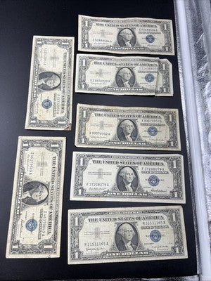 Lot of 7 Circ 1957 $1 One Dollar US Silver Certificates Blue Seal Notes #165