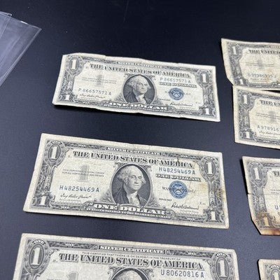 Lot of 7 1935 1957 $1 One Dollar Blue Seal Silver Certificates Very Circulated 7