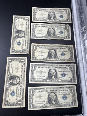 Lot of 7 Circ 1957 $1 One Dollar US Silver Certificates Blue Seal Notes #165