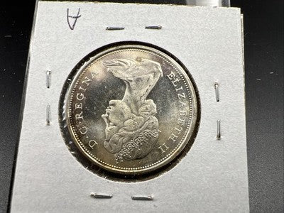 1967 Canada 50 Cents Silver Coin UNC Uncirculated Some Toning