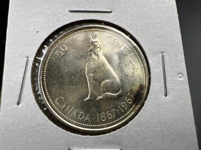 1967 Canada 50 Cents Silver Coin UNC Uncirculated Some Toning