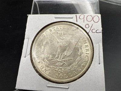 1900 O / CC $1 Morgan Silver Dollar Coin AU About UNC SK#1a
