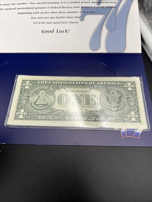 2009 $1 FRN Lucky Serial #77769907 Federal Reserve Note CH UNC in Display Folder