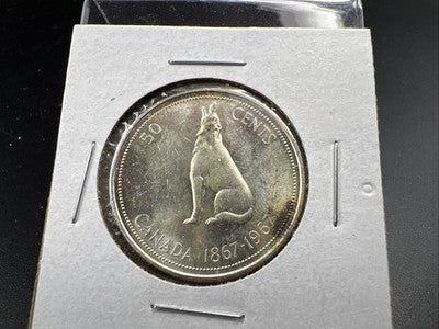1967 Canada 50 Cents Silver Coin UNC Uncirculated Some Toning
