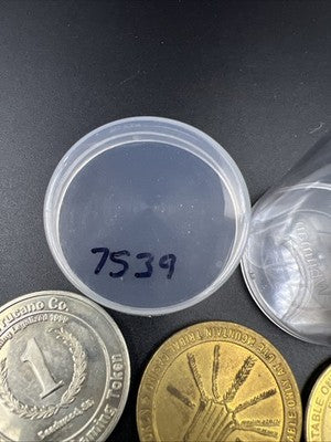 Lot of 20 $1 Casino Dollar Gaming Tokens Metal Circulated Conditions SKU#7539