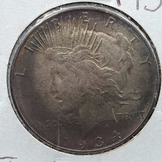 1934 D Peace 90% Silver Eagle Dollar Coin CH VF / XF Halo Toned Obverse