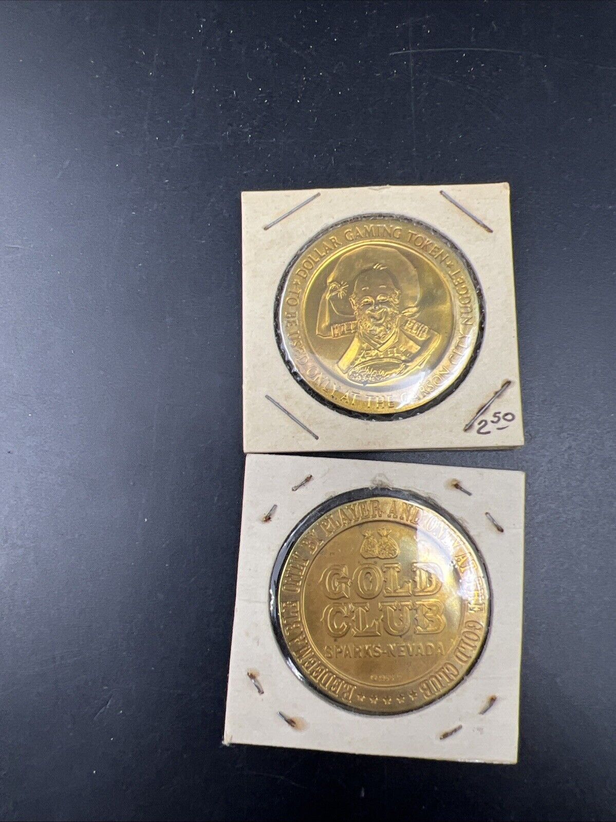 Lot of 2 Specimine Proof Strike Casino Tokens Carson City Nugget & Gold Club