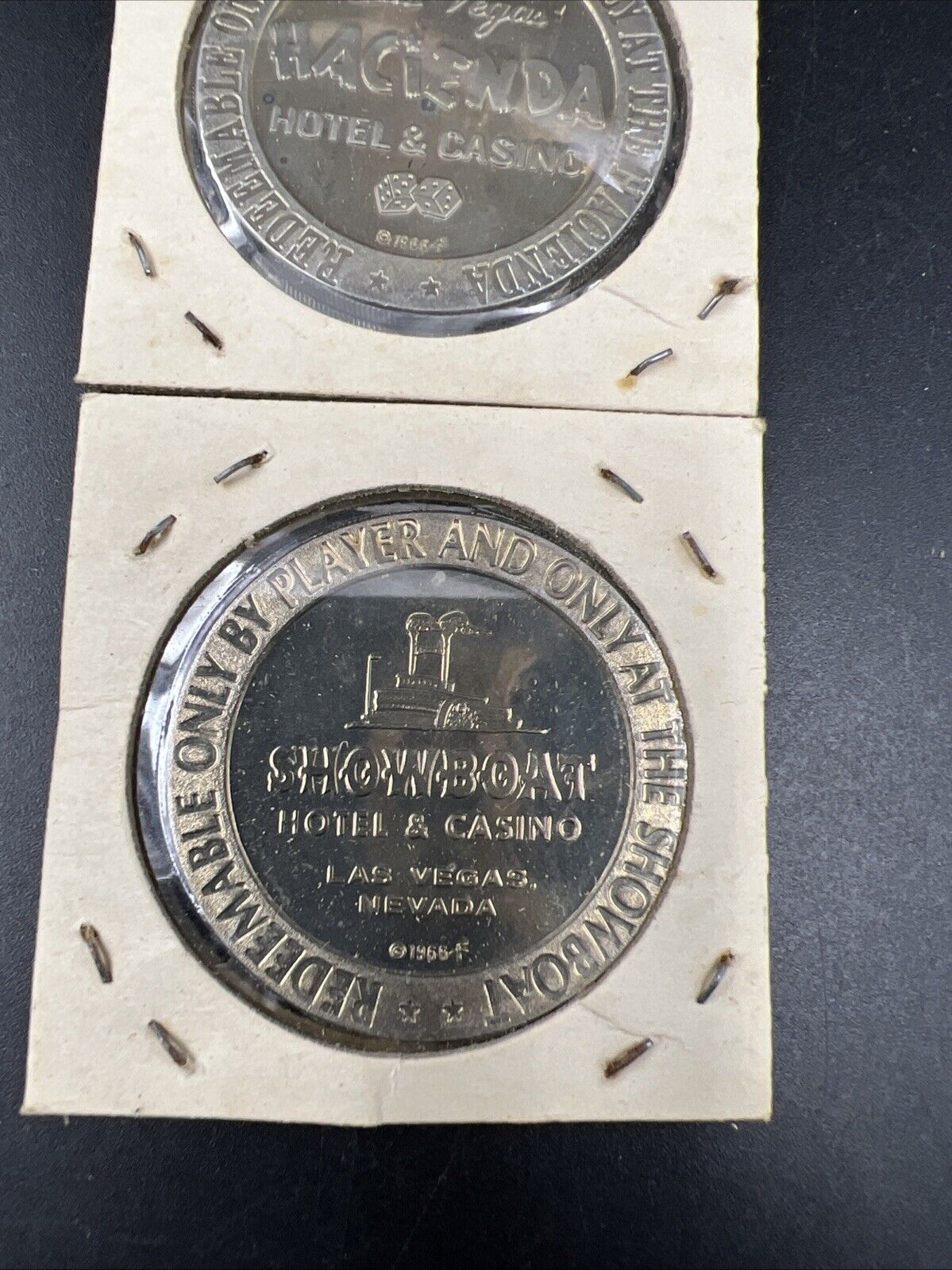 Lot of 2 Specimine / Proof Strike Casino Tokens Las Vegas Showboat & Hacienda